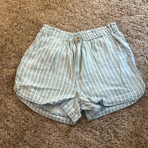 Size medium denim and white striped short. Elastic waist.